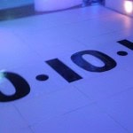 date on sticker on whtie dance floor