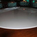 Photo of white glossy round dance floor